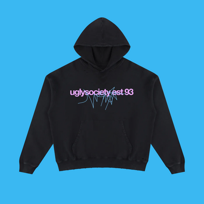 A black pullover hoodie with a front kangaroo pocket and a graphic print on the chest reading 'uglysociety est 93' in purple, accented with blue sketch lines, shown on a plain white background.