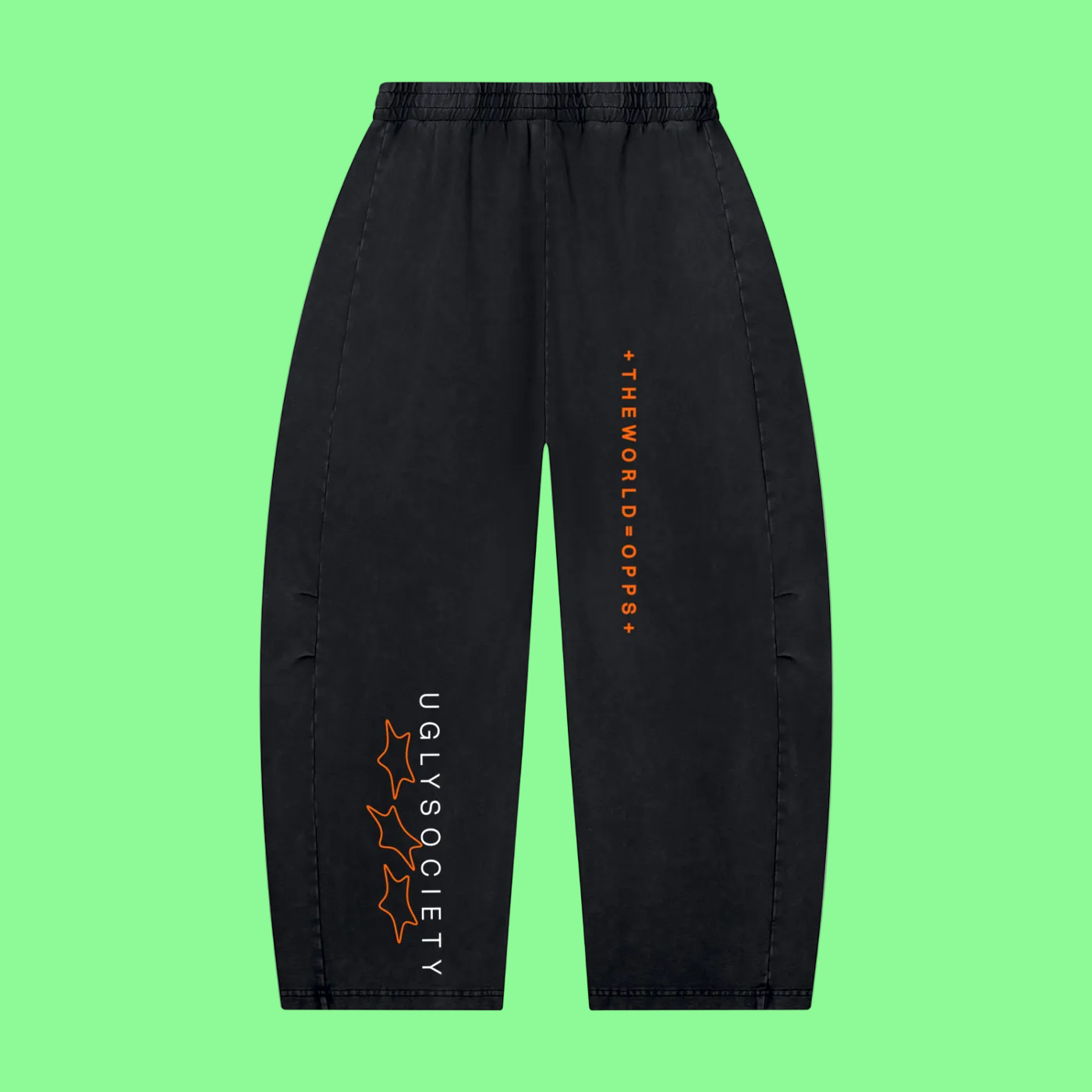 Black pants with orange and white text on a white background