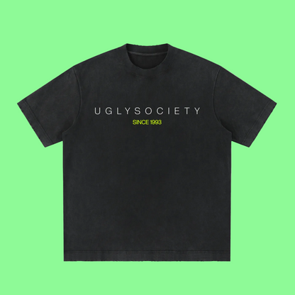 Black t-shirt with 'Drei' logo on a white background