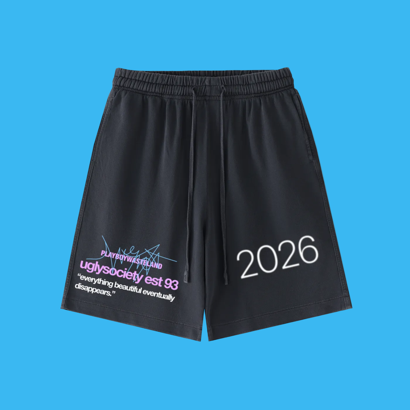Black athletic shorts with an elastic waistband and drawstring, featuring white '2026' text on the right leg and a purple graphic print with white text on the left leg, shown against a plain white background.